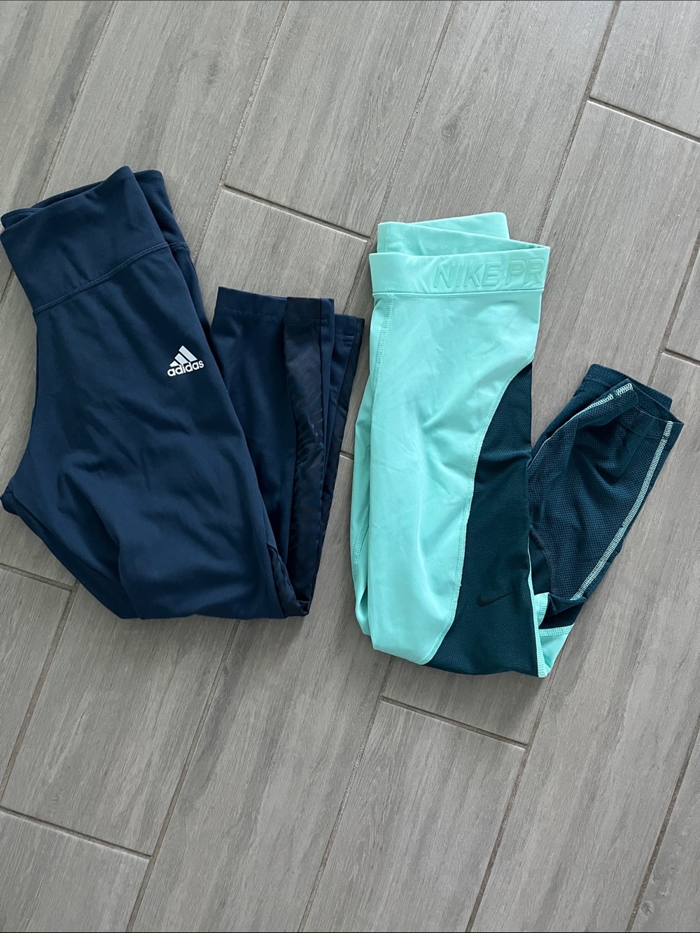 Two XS leggings, Adidas and Nike.